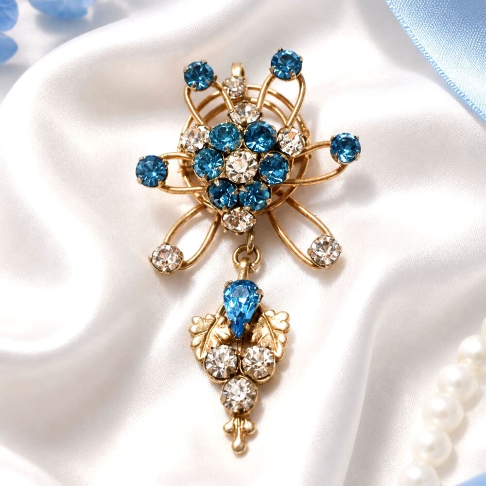 Vintage Mid Century Gold Tone Blue Rhinestone Floral Like Brooch Pendant